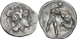 Greek Italy. Southern Apulia, Tarentum. AR Diobol, c. 380-325 BC. Obv. Helmeted head of Athena right, helmet decorated with Scylla hurling rock. Rev. ...