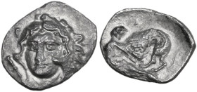 Greek Italy. Southern Apulia, Tarentum. AR Diobol, c. 325-280 BC. Obv. Head of Herakles facing slightly left; club to left. Rev. Herakles strangling t...