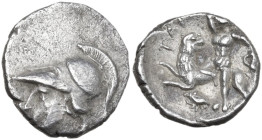 Greek Italy. Southern Apulia, Tarentum. AR Diobol, c. 280-228 BC. Obv. Head of Athena left, wearing Corinthian helmet. Rev. TAP[...]. Herakles, prepar...