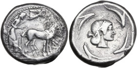 Sicily. Syracuse. Gelon (485-478 BC). AR Tetradrachm. Struck circa 478-475 BC. Obv. Charioteer driving slow quadriga right, holding kentron in right h...