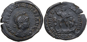 Valentinian II (375-392). AE 25 mm. Constantinople mint. Obv. D N VALENTINIANVS P F AVG. Diademed, helmeted, draped and cuirassed bust right, holding ...