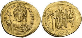 Justinian I (527-565). AV Solidus. Constantinople mint, c. 545-565 AD. Obv. DN IVSTINIANVS PP AVC. Helmeted and cuirassed bust facing, holding globus ...