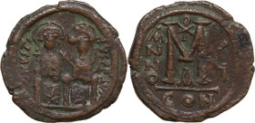 Justin II and Sofia (565-578). AE Follis. Constantinople mint, 1st officina, dated RY 6 = 570/1. Obv. Justin, holding globus cruciger in left hand, an...