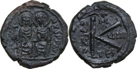 Justin II and Sophia (565-578). AE Half Follis. Thessalonica mint. Obv. DN IVSTINVS PP AV. Nimbate figures of Justin and Sophia seated facing on doubl...