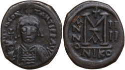 Tiberius II Constantine (578-582). AE Follis, Nicomedia mint, 1st officina. Dated RY 4 (578/9). Obv. Crowned facing bust, holding globus-cruciger and ...