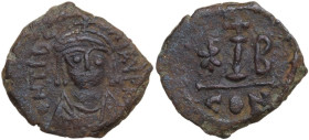 Maurice Tiberius (582-602). AE Decanummium. Constantinople mint, 2nd officina. Obv. Crowned, draped, and cuirassed bust facing. Rev. Large I; cross ab...