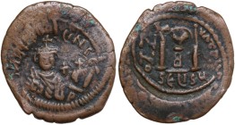 Heraclius, with Heraclius Constantine (610-641). AE Follis. Seleucia Isauriae mint, 2nd officina. Dated RY [?] Overstruck on early Follis of Theoupoli...