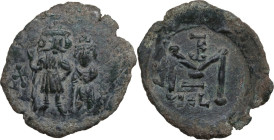 Constans II (641-668). AE Follis, Syracuse mint, 654-659. Obv. Constans, holding staff, and Constantine, holding globus cruciger, standing facing. Rev...