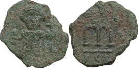 Leontius (695-698). AE Follis, Syracuse mint, 695-698 AD. Obv. Leontius standing facing, wearing crown and loros, and holding akakia and globus crucig...