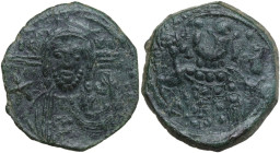 Michael VII Ducas (1071-1078). AE Follis. Constantinople mint. Obv. Facing bust of Christ, raising hand in benediction and holding Gospels; nimbus wit...