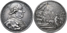 Pio VI (1775-1799), Giovanni Angelo Braschi. Medaglia A. XXI per l'istituzione dell'Opera Pia della Ospitalità Francese. D/ PIVS SEXTVS PONT MAX A XXI...