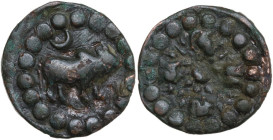 Nepal. Lichchhavi Period. Narendradeva (641-680). AE drachm, Pashupati type. Obv. Bull standing right; above, crescent. Rev. Sun. AE. 3.84 g. 20.00 mm...