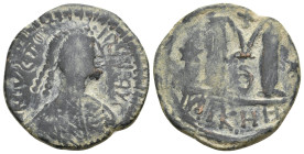 JUSTIN I, 518-527 AD. AE, Follis. Uncertain mint. 15.21 g. 30 mm. Overstruck.