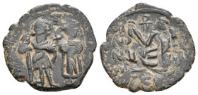 Islamic, Arab-Byzantine. Umayyad Calıphate. Pseudo Byzantine Type.Imitating the Types of CONSTANS II, 647-670 AD. AE, Follis. 3.90 g. 23.3 mm.