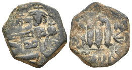 Islamic. Arab-Byzantine, Umayyad Caliphate. Pseudo-Byzantine type, imitating the types of CONSTANS II, 640-650 AD. AE, Fals. Uncertain mint. Overstruc...