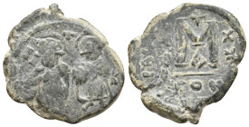 Islamic. Arab-Byzantine, Umayyad Caliphate. Pseudo-Byzantine type, imitating the types of CONSTANS II, 640-650 AD. AE, Fals. Uncertain mint. 11.49 g. ...