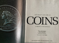 Clain-Stefanelli E.V. The Beauty and Lore of Coins currency and Medals. New York 1974. Tela ed. Con titolo in oro al dorso, pp. 256, ill. A colori. Bu...