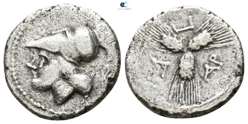Apulia. Arpi circa 215-212 BC. 
Triobol AR

13mm., 1,85g.

Helmeted head of...
