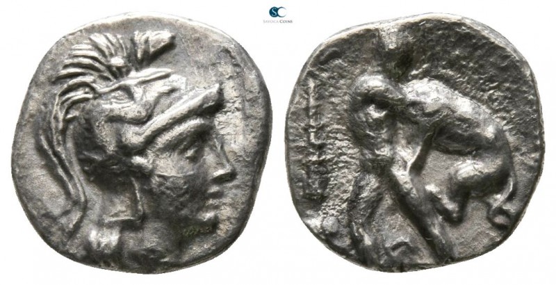Calabria. Tarentum circa 380-325 BC. 
Diobol AR

9mm., 0,98g.

Helmeted hea...