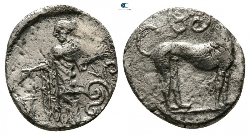 Sicily. Eryx circa 435-425 BC. 
Litra AR

10mm., 0,69g.

Hound standing rig...