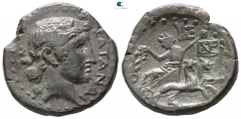 Sicily. Katane after 212 BC. 
Bronze Æ

20mm., 8,99g.

KATANAI-Ω-N, wreathe...