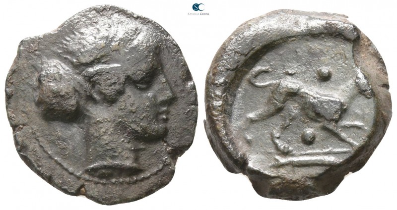 Sicily. Syracuse 400-390 BC. 
Trias Æ

18mm., 6,32g.

Head of Aigiste right...