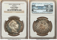 Prussia. Wilhelm II Proof 5 Marks 1907-A PR66 Cameo NGC KM523, J-104. Flashy mirrored surfaces, with blue iridescence along the peripheries, give this...