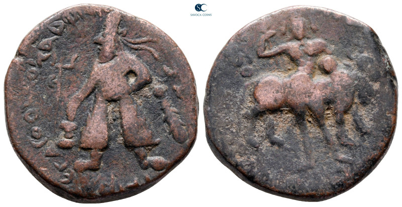 Kushan Empire. Main mint in Begram. Vima Kadphises AD 113-127. 
Tetradrachm Æ
...