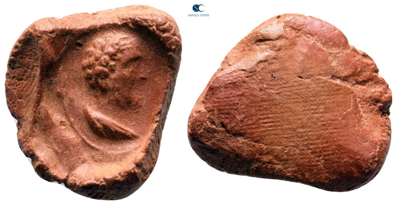 Antoninus Pius AD 138-161. 
Uniface terracotta clay seal

20 mm, 1,64 g


...