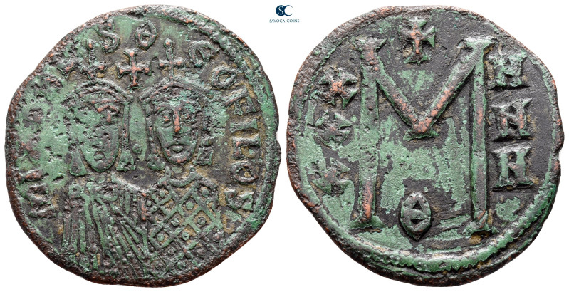 Michael II with Theophilus AD 820-829. Constantinople
Follis or 40 Nummi Æ

3...