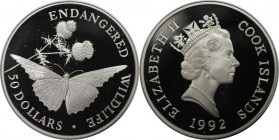 Weltmünzen und Medaillen, Cookinseln / Cook Islands. Gefährdete Wildtiere - Schmetterling und Distel. 50 Dollars 1992, Silber. 0.58 OZ. KM 244. Polier...