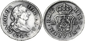 1783. Carlos III. Madrid. JD. 1/2 real. (AC. 168). Resto de soldadura en reverso. 1,40 g. (MBC-).