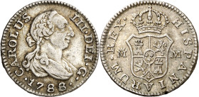 1788/7. Carlos III. Madrid. M. 1/2 real. (AC. 172.1). Rara sobrefecha. En el año 1787 no se acuñó este valor en esta ceca. Único año de este ensayador...