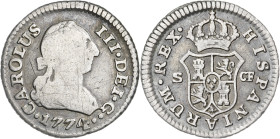 1774. Carlos III. Sevilla. CF. 1/2 real. (AC. 312). Escasa. 1,34 g. BC/MBC-.
