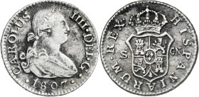 1807. Carlos IV. Sevilla. CN. 1/2 real. (AC. 361). Oxidaciones. 1,46 g. (MBC-).