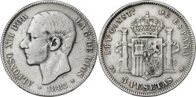 1882/1*1881. Alfonso XII. MSM. 5 pesetas. Golpes sobre la 2º estrella. 24,75 g. BC.