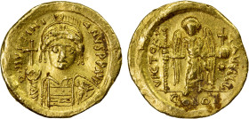 BYZANTINE EMPIRE: Justinian I, 527-565, AV solidus (4.46g), Constantinople, S-139, helmeted and cuirassed bust, holding globus cruciger & shield // an...
