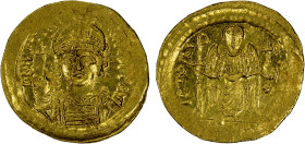 BYZANTINE EMPIRE: Justinian I, 527-565, AV solidus (4.49g), Constantinople, S-140, cuirassed bust facing, wearing helmet with pendilia, holding globus...