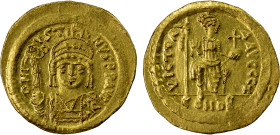 BYZANTINE EMPIRE: Justin II, 565-578, AV solidus (4.47g), Constantinople, S-345, helmeted & cuirassed bust, beardless, holding Victory on globe & shie...