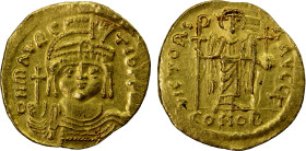 BYZANTINE EMPIRE: Maurice Tiberius, 582-602, AV solidus (4.40g), Constantinople, S-476, helmeted & cuirassed bust, holding globus cruciger & shield, s...