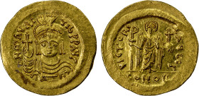 BYZANTINE EMPIRE: Maurice Tiberius, 582-602, AV solidus (4.42g), Constantinople, S-478, helmeted & cuirassed bust, holding globus cruciger & shield, s...