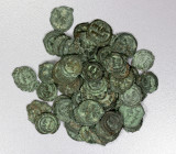 UMAYYAD: LOT of 57 tiny cast copper coins from eastern Khorasan, nearly all of two major anonymous types: A-E197, cast fals of Balkh, inscribed bism A...