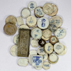 SOUTH EAST ASIA: LOT of 40 items, including Thailand or Siamese porcelain gambling tokens with Chinese characters (37 pcs), an older clay gambling tok...
