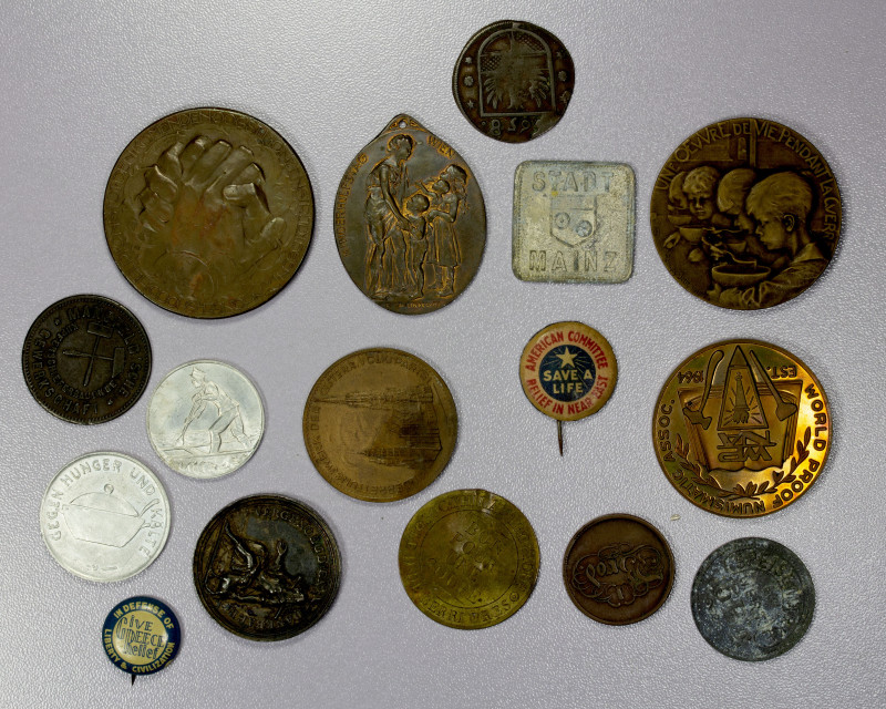 WORLDWIDE: LOT of 16 tokens, medals, and pins, all bread or famine related, incl...