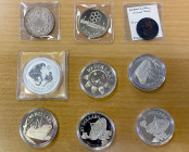 WORLDWIDE: LOT of 8 coins and 1 token, somewhat diverse mix including: Australia (1 pc), Ceylon (1), New Zealand (1), and Singapore (6); mostly silver...