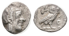 ATTICA. Athens. Obol (Circa 500/490-485/0 BC).
Obv: Helmeted head of Athena right.
Rev: AΘE. Owl standing right, head facing; olive sprig and crescent...