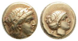 LESBOS. Mytilene. EL Hekte (Circa 377-326 BC).
Obv: Laureate head of Apollo right; to left, serpent coiled right.
Rev: Head of Artemis right, with hai...