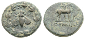 IONIA, Ephesos (Circa 202-133 BC). Ae.
Obv: E - Φ. Bee within wreath.
Rev: APKAΣ. Stag standing right before palm tree; monogram in front. BMC 135.
Co...