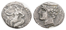 Greek Coins, CILICIA. Uncertain. Obol (4th century BC). 0,55 g. 11,1 mm.
Obv: Aphrodite, holding lotus, seated left on throne decorated with two sphi...
