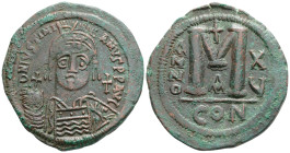 JUSTINIAN I (527-565). Follis. Constantinople. Dated RY 15 (541/2).
Obv: D N IVSTINIANVS P P AVG.
Helmeted and cuirassed bust facing, holding globus c...